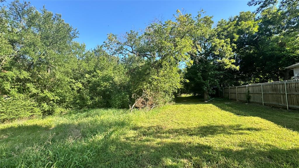 0 East Nelson Street Denison, TX 75021 - Photo 10 of 28 a view of yard with green space