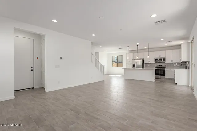 a view of kitchen with wooden floor