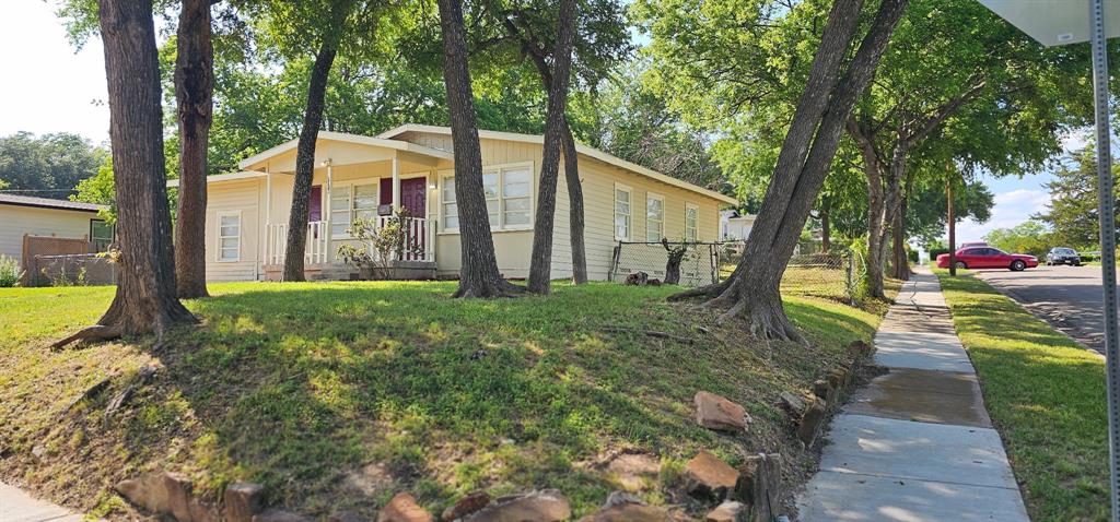5170 Cardiff Street Dallas, TX 75241 - Photo 14 of 14 View of front of property with a front lawn