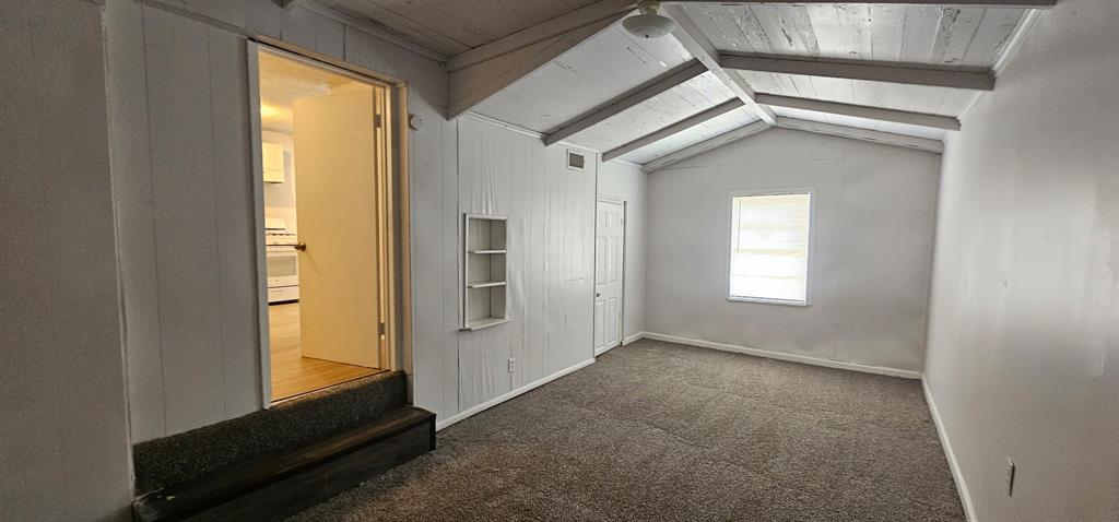 5170 Cardiff Street Dallas, TX 75241 - Photo 6 of 14 Bonus room featuring carpet floors, wood ceiling, and baseboards