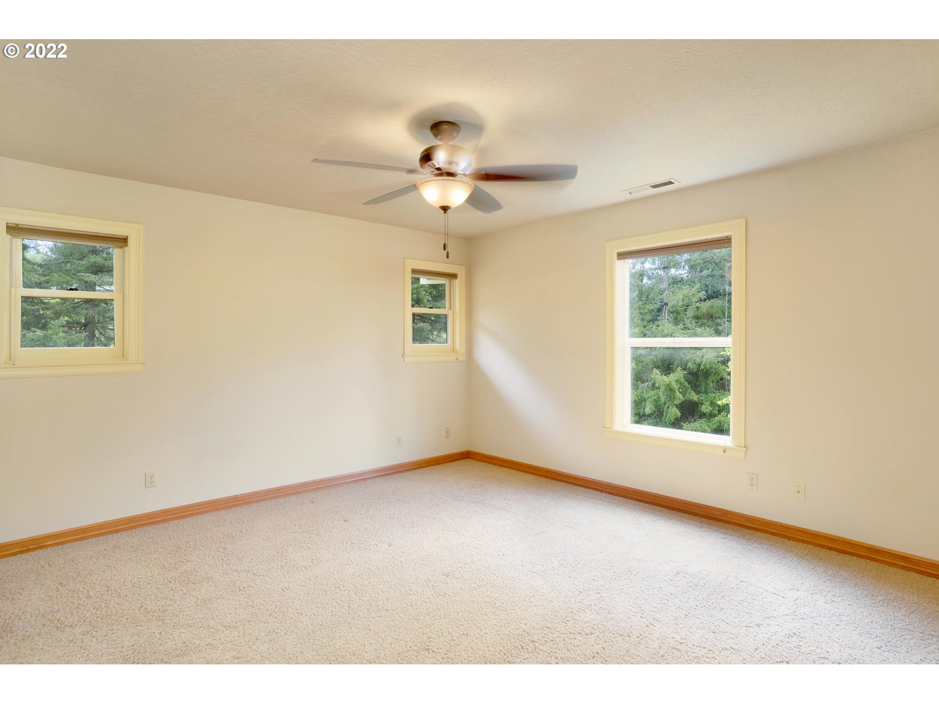 16410 Southeast Royer Road Damascus, OR 97089 - Photo 15 of 32 a view of an empty room with a window