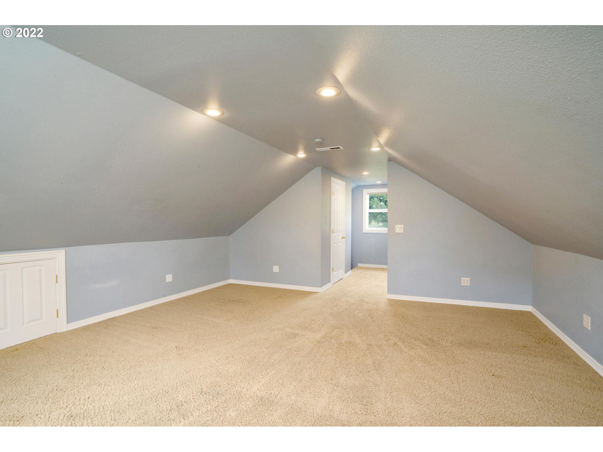 16410 Southeast Royer Road Damascus, OR 97089 - Photo 20 of 32 a view of an empty room with wooden floor