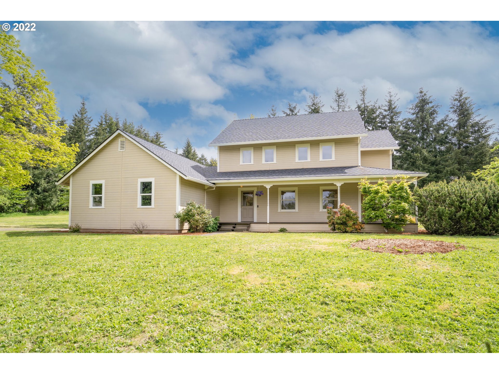 16410 Southeast Royer Road Damascus, OR 97089 - Photo 2 of 32 a view of a house with a yard and potted plants