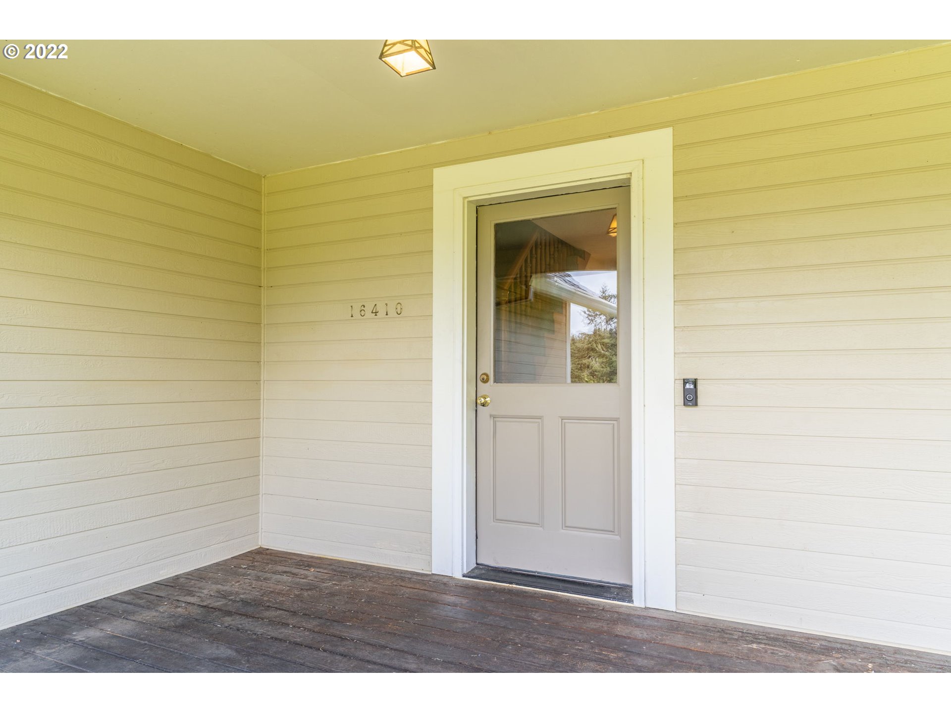 16410 Southeast Royer Road Damascus, OR 97089 - Photo 3 of 32 a view of wooden door