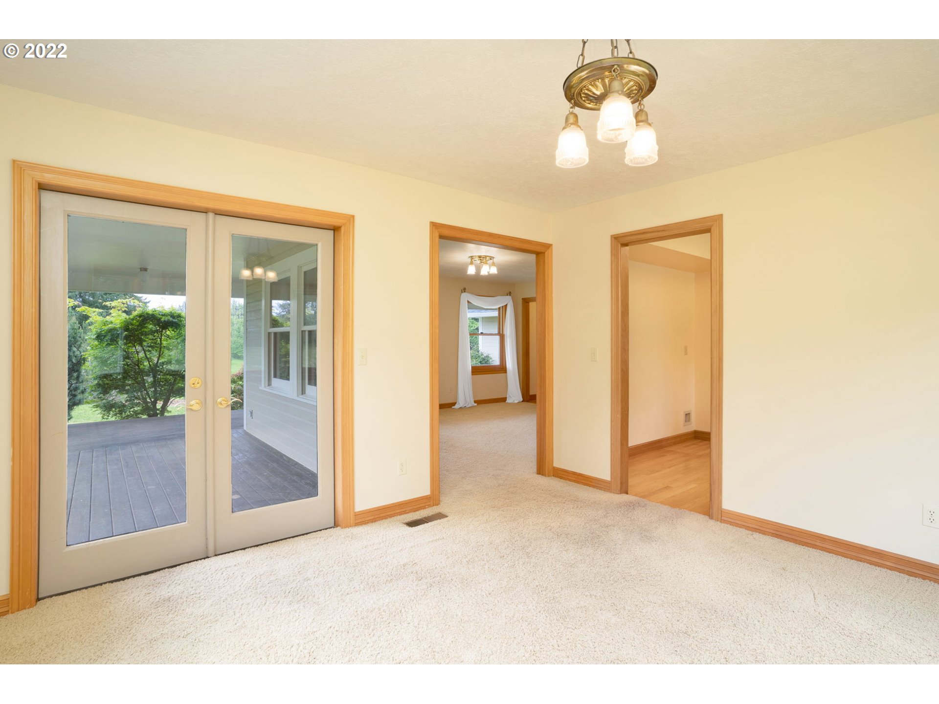 16410 Southeast Royer Road Damascus, OR 97089 - Photo 4 of 32 a view of a chandelier fan and entryway