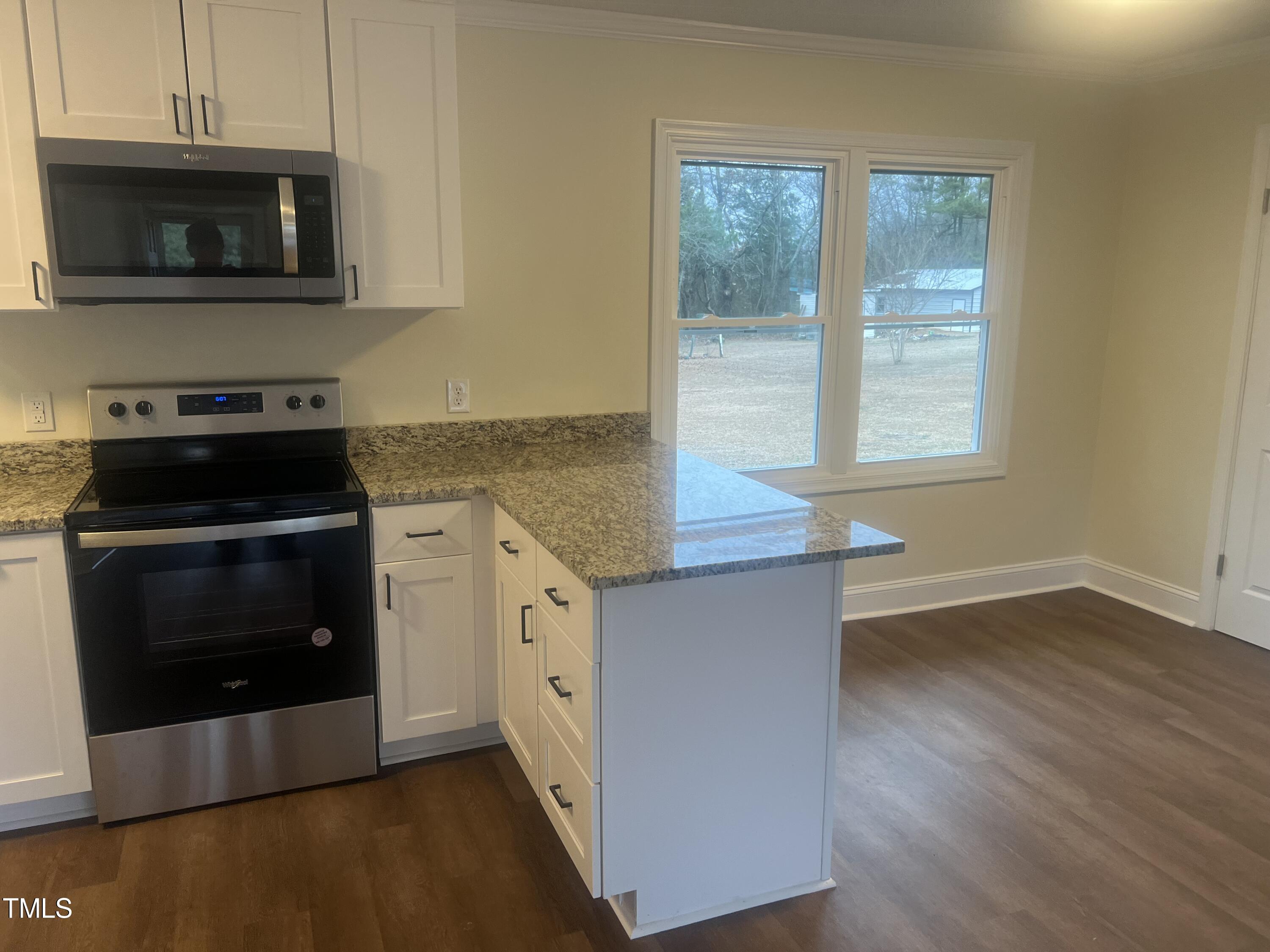 1166 Aquilla Road Benson, NC 27504 - Photo 16 of 32 Kitchen and Bar Area