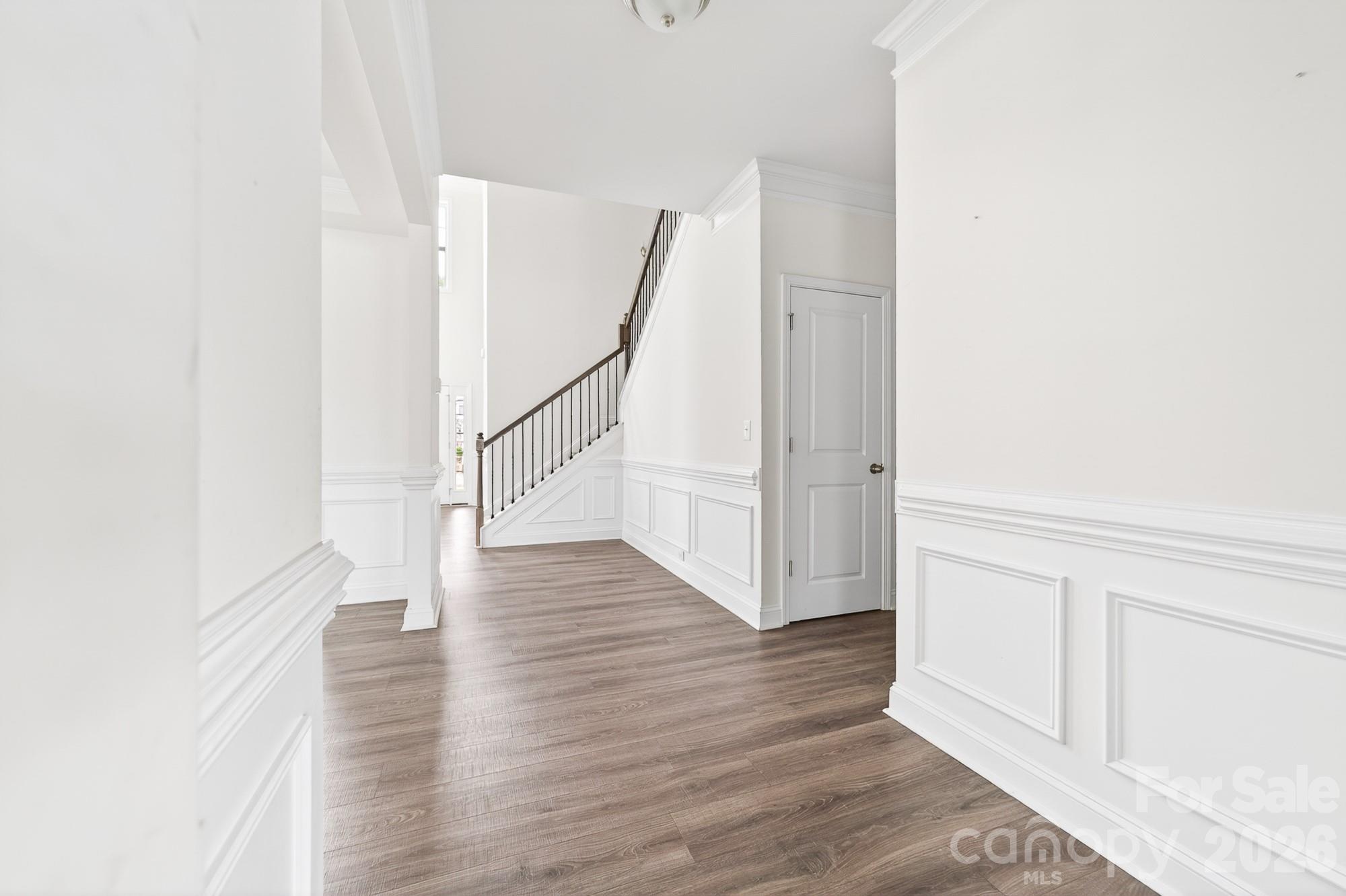 5972 Redwood Pine Road Concord, NC 28027 - Photo 8 of 37 a view of entryway with wooden floor