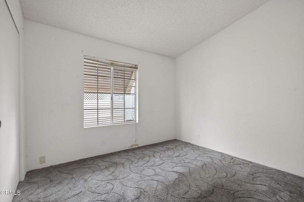 2177 Robin Avenue, Unit 2177A Oxnard, CA 93033 - Photo 16 of 29 a view of an empty room with a window