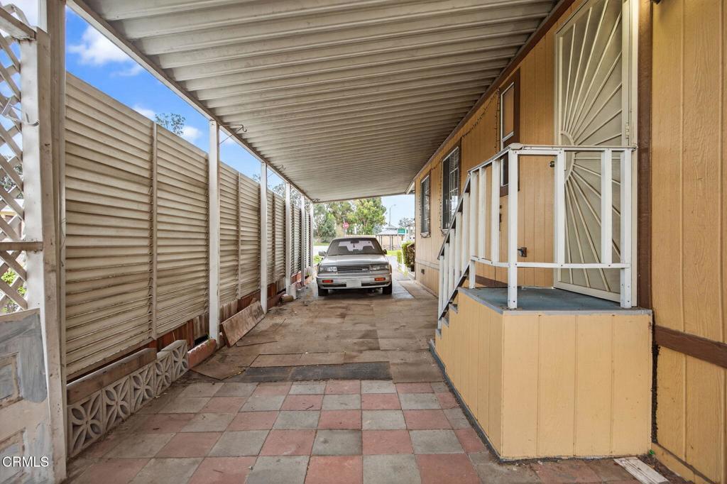 2177 Robin Avenue, Unit 2177A Oxnard, CA 93033 - Photo 28 of 29 a view of a porch with furniture