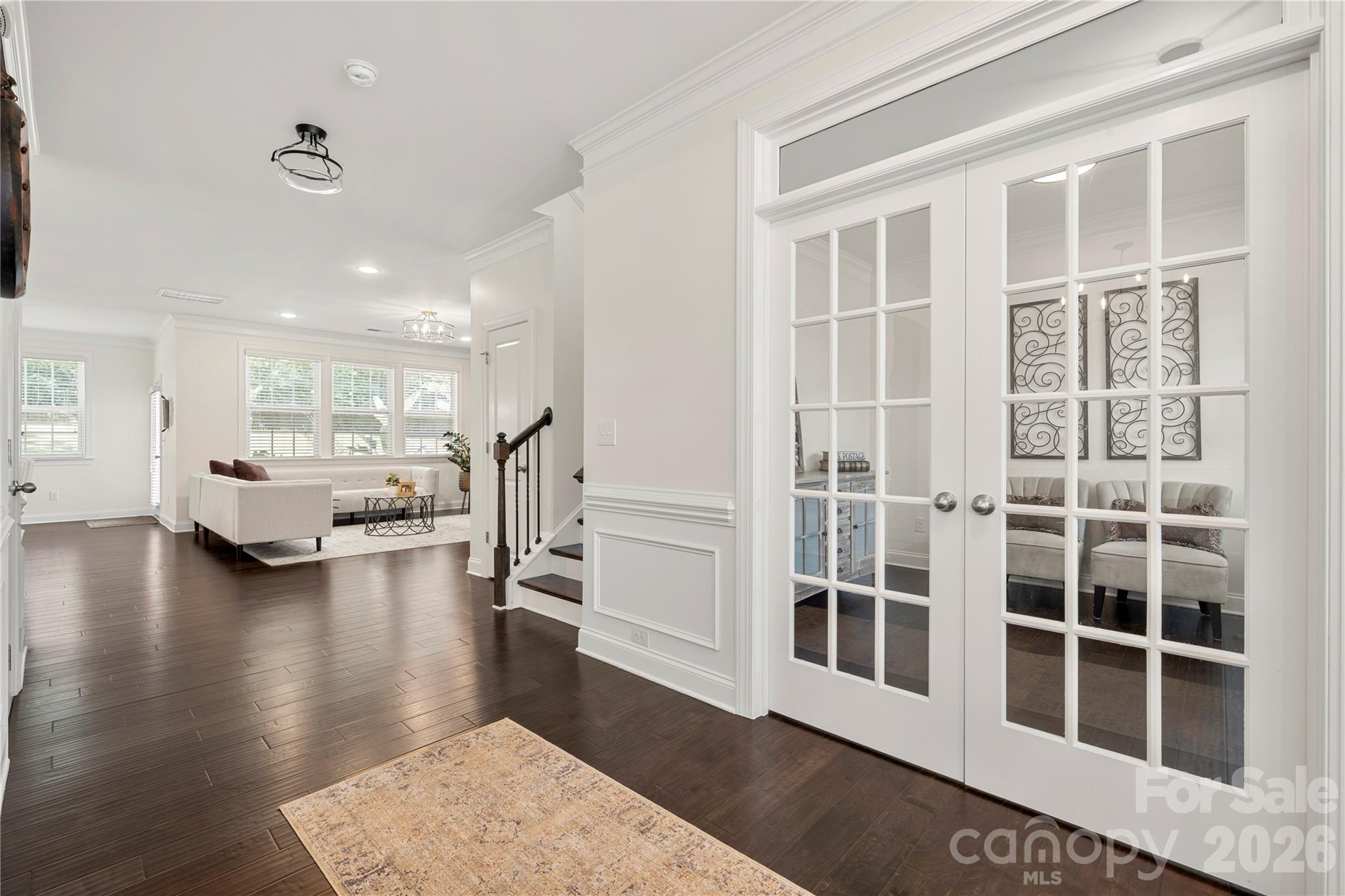 11266 Trailside Road Concord, NC 28027 - Photo 6 of 48 a living room with furniture window and wooden floor