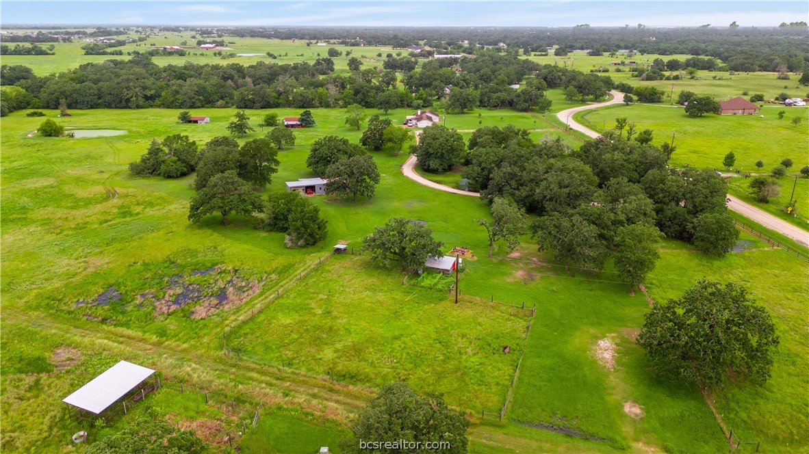8166 Riley Road Bryan, TX 77808 - Photo 11 of 46 a view of a lake with a houses