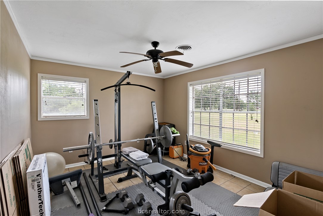 8166 Riley Road Bryan, TX 77808 - Photo 31 of 46 a work room with furniture and windows