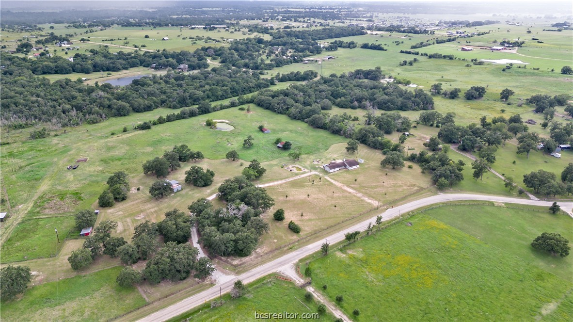 8166 Riley Road Bryan, TX 77808 - Photo 39 of 46 an aerial view of a house with a yard