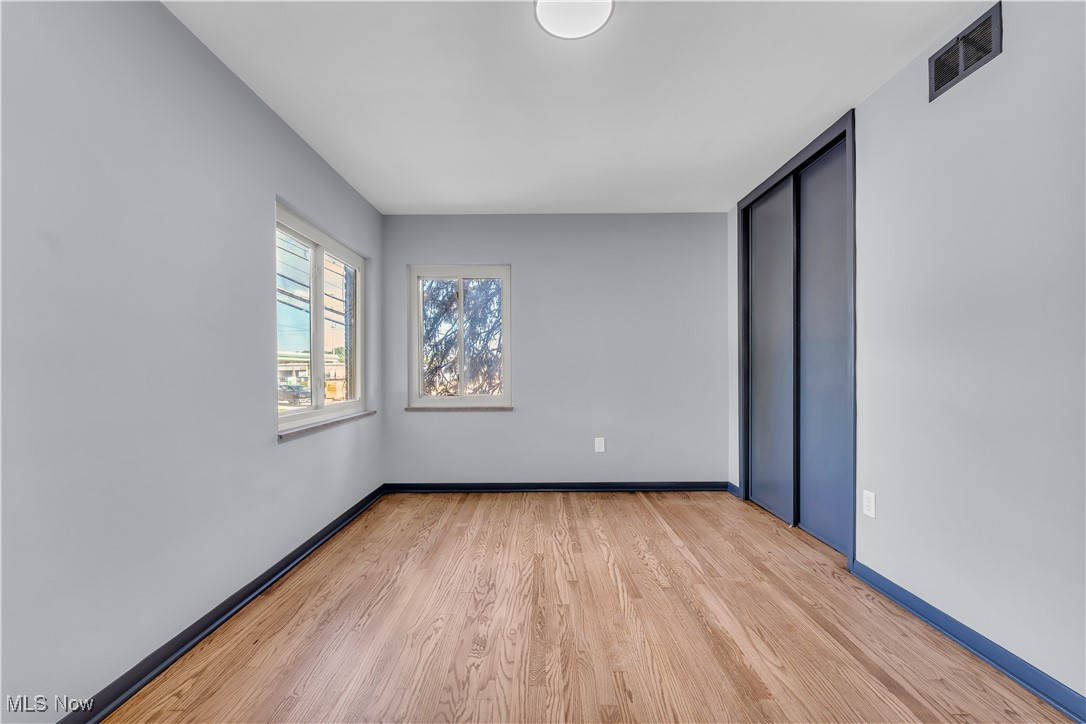 5235 State Road, Unit 3 Cleveland, OH 44134 - Photo 14 of 21 Empty room featuring light hardwood / wood-style floors