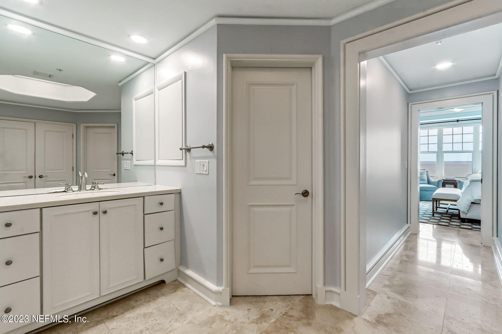 2358 Riverside Avenue, Unit 401 Jacksonville, FL 32204 - Photo 42 of 92 a spacious bathroom with a double vanity sink and a mirror