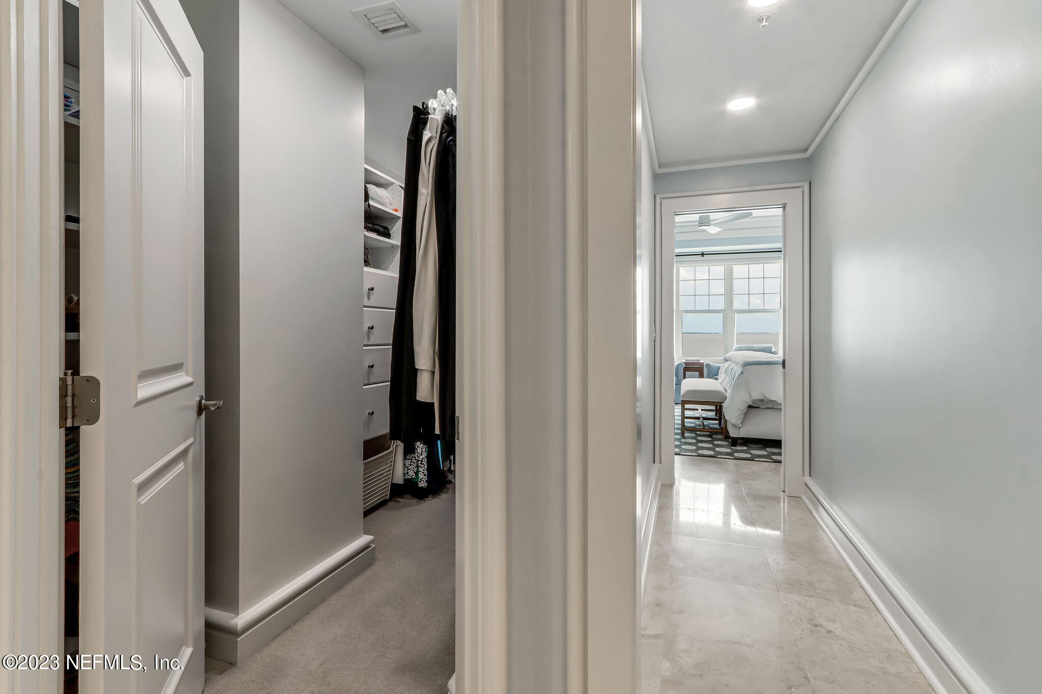 2358 Riverside Avenue, Unit 401 Jacksonville, FL 32204 - Photo 44 of 92 a view of a hallway with a livingroom and a bathroom
