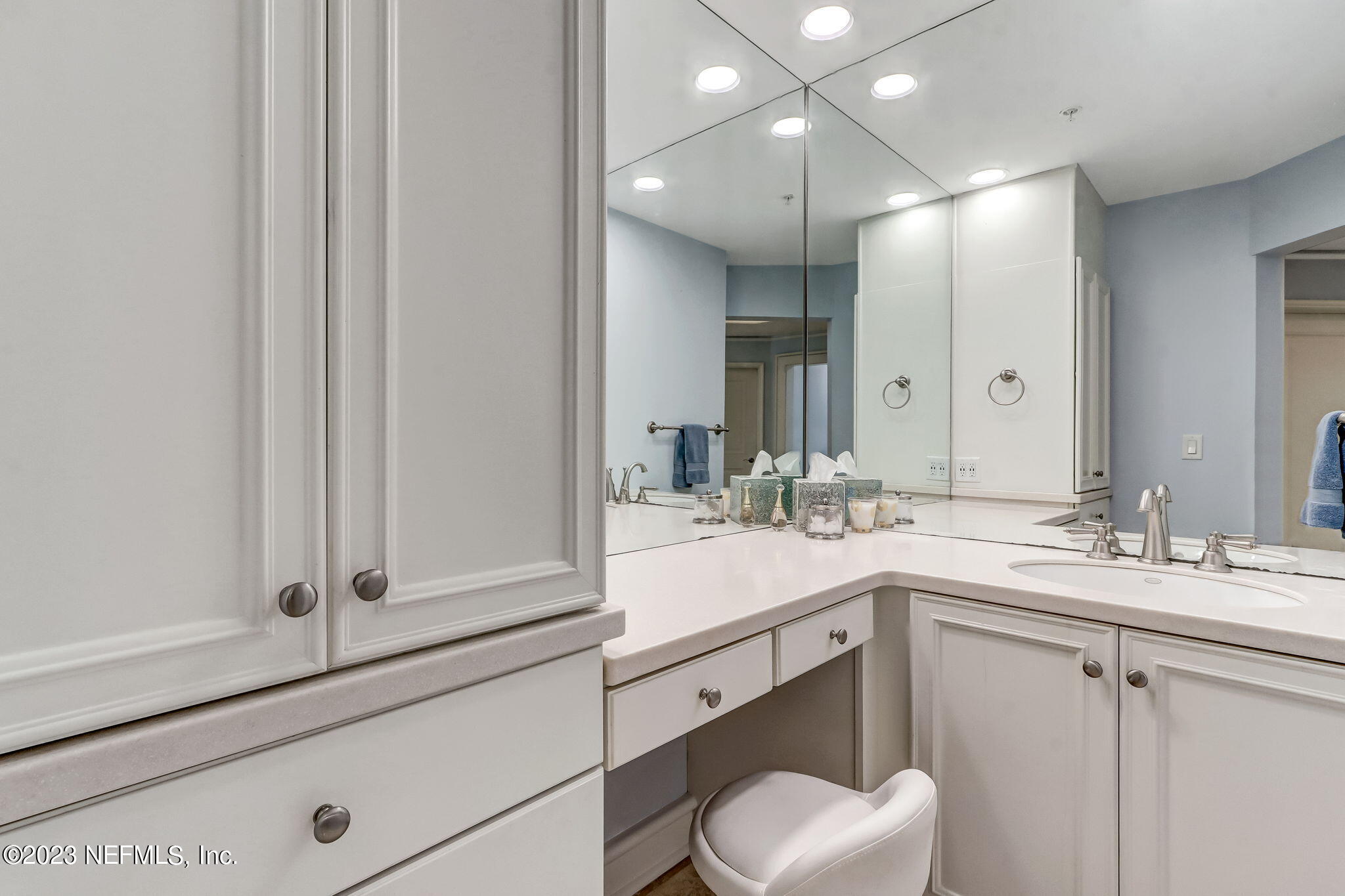 2358 Riverside Avenue, Unit 401 Jacksonville, FL 32204 - Photo 48 of 92 a bathroom with a sink and a mirror