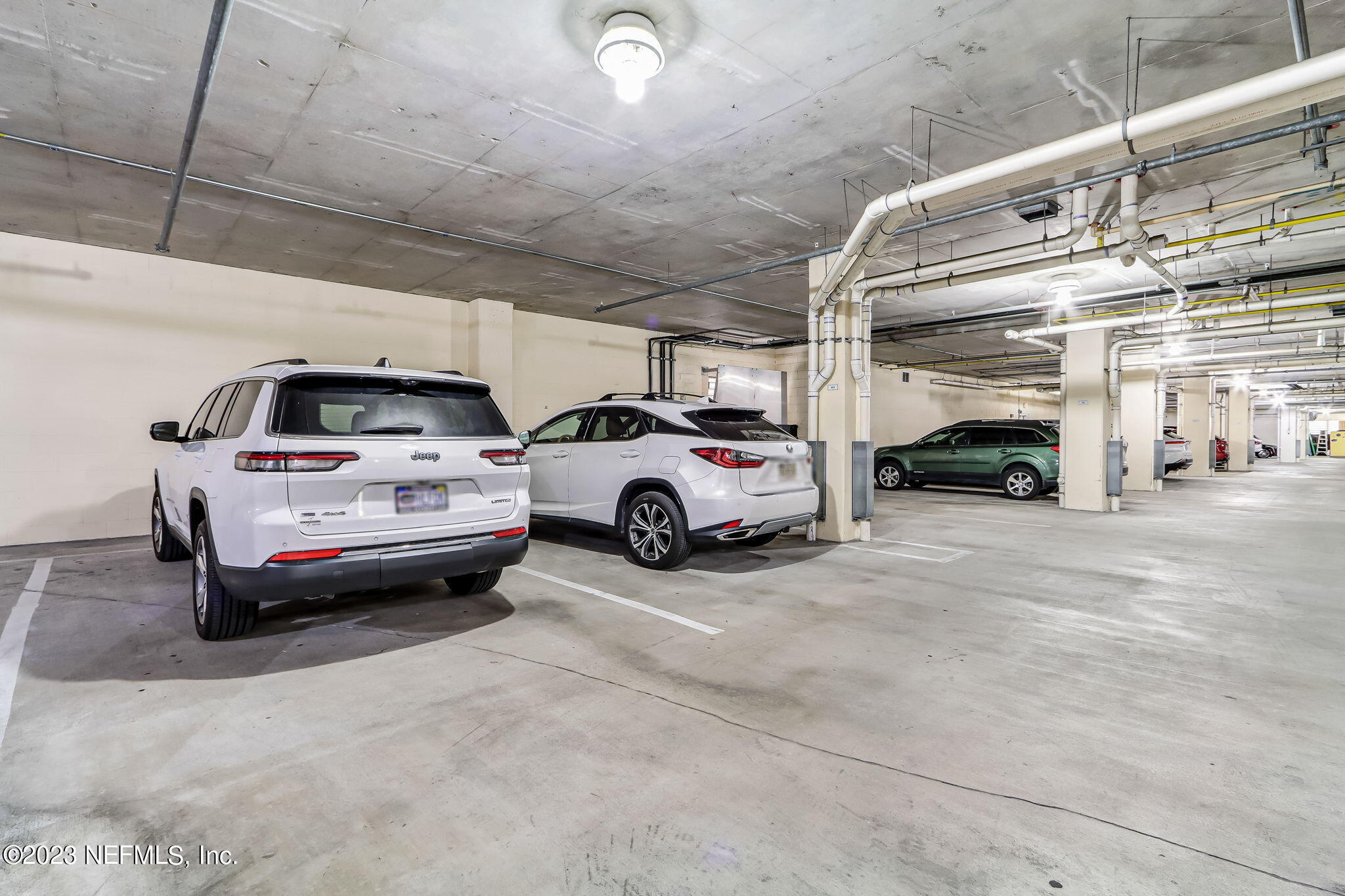 2358 Riverside Avenue, Unit 401 Jacksonville, FL 32204 - Photo 64 of 92 a view of cars parked in a parking