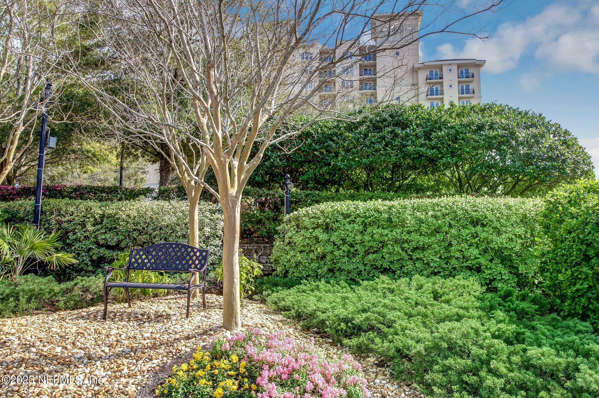 2358 Riverside Avenue, Unit 401 Jacksonville, FL 32204 - Photo 8 of 92 a backyard of a house with lots of green space and fountain