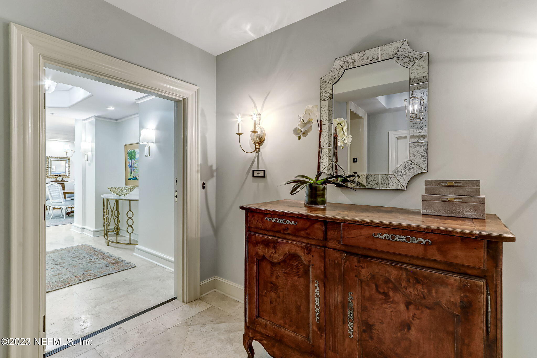 2358 Riverside Avenue, Unit 401 Jacksonville, FL 32204 - Photo 9 of 92 a bathroom with a sink and a mirror