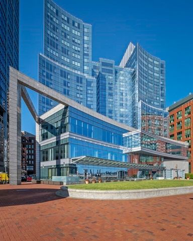 a front view of a building with a yard