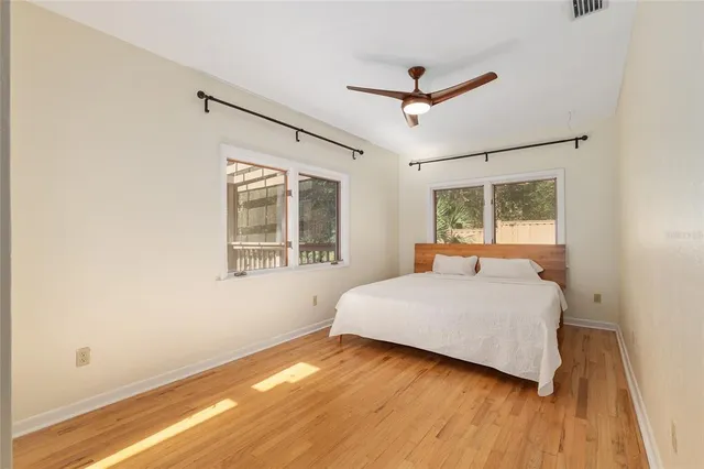 a view of a porch with a wooden fence