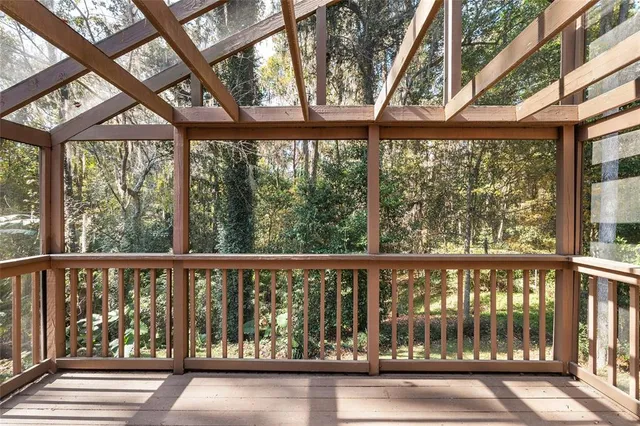 a bathroom with a double vanity sink toilet and shower