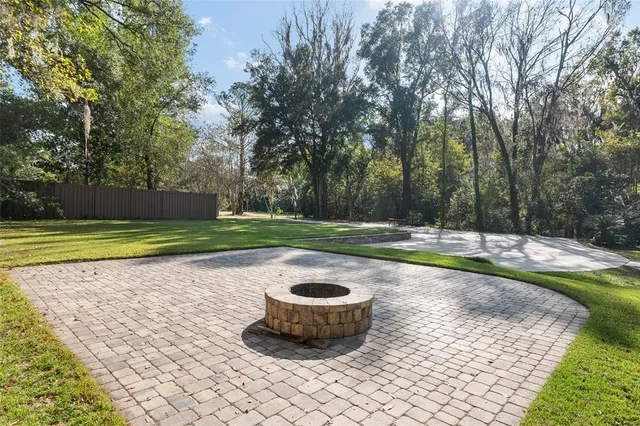 a front view of a house with yard