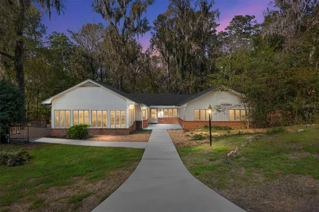 an aerial view of residential houses with city view and mountain view