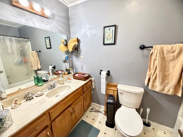 2575 Spur Road Decherd, TN 37324 - Photo 11 of 18 a bathroom with a sink mirror vanity and toilet