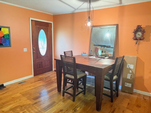 2575 Spur Road Decherd, TN 37324 - Photo 5 of 18 a dining room with furniture and wooden floor