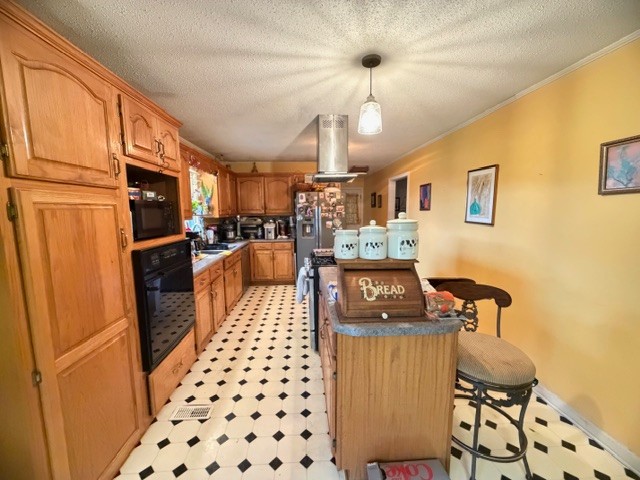 2575 Spur Road Decherd, TN 37324 - Photo 6 of 18 a kitchen with stainless steel appliances granite countertop a refrigerator and a stove top oven