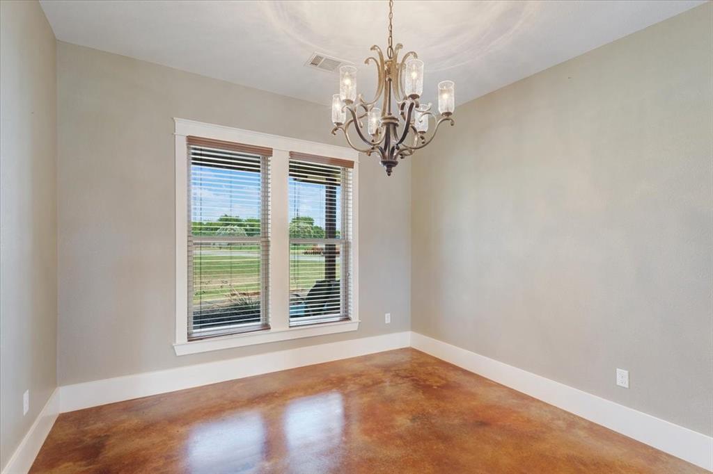 516 Springtown Road Van Alstyne, TX 75495 - Photo 11 of 40 a view of a livingroom with a ceiling fan and window