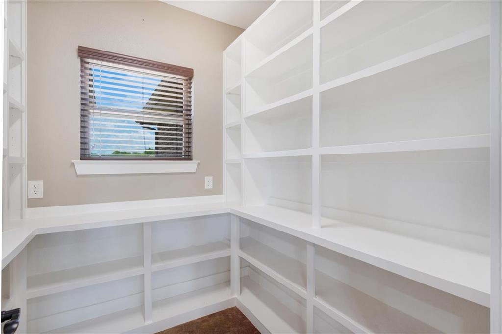 516 Springtown Road Van Alstyne, TX 75495 - Photo 17 of 40 a view of an empty walk in closet