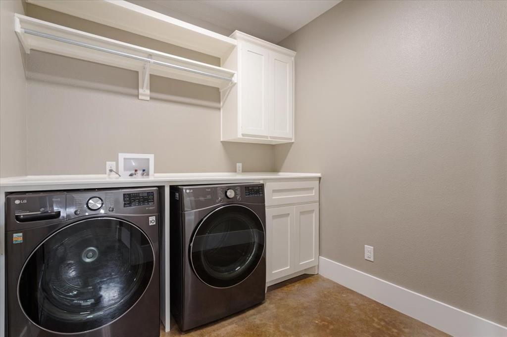 516 Springtown Road Van Alstyne, TX 75495 - Photo 24 of 40 a utility room with dryer and washer