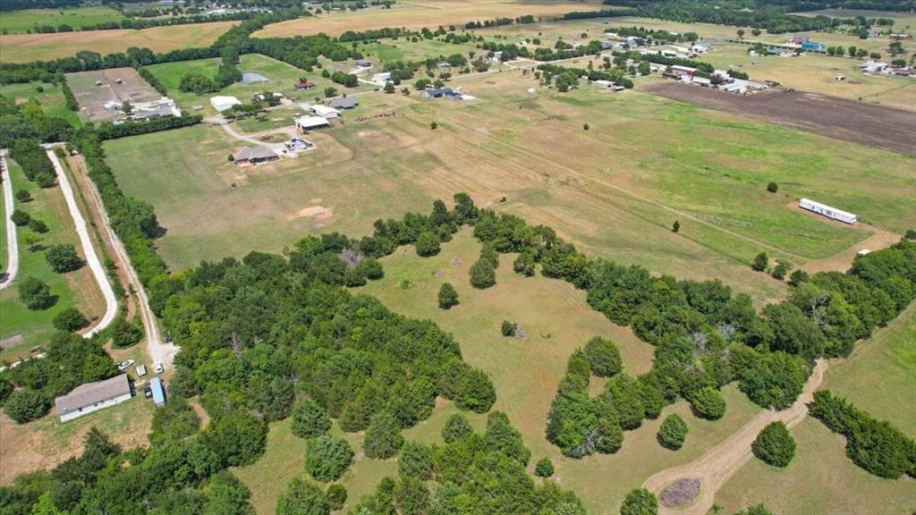 516 Springtown Road Van Alstyne, TX 75495 - Photo 40 of 40 an aerial view of residential houses with outdoor space