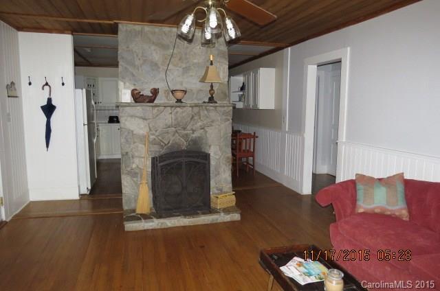 4020 Polk County Line Road Rutherfordton, NC 28139 - Photo 8 of 18 a living room with furniture and a fireplace