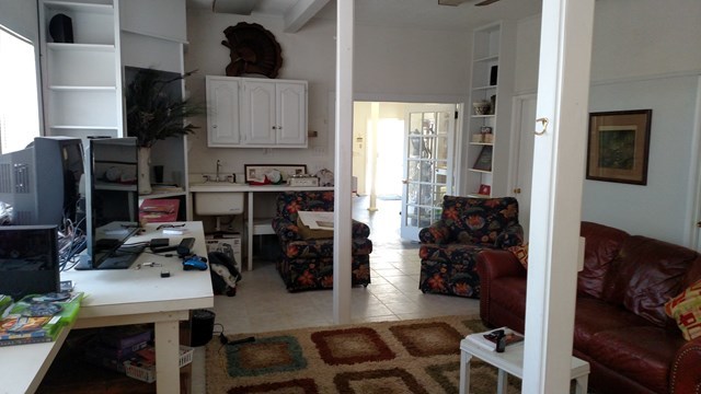 7808 Whittle Road Macon, GA 31220 - Photo 14 of 20 a living room with furniture and a lamp