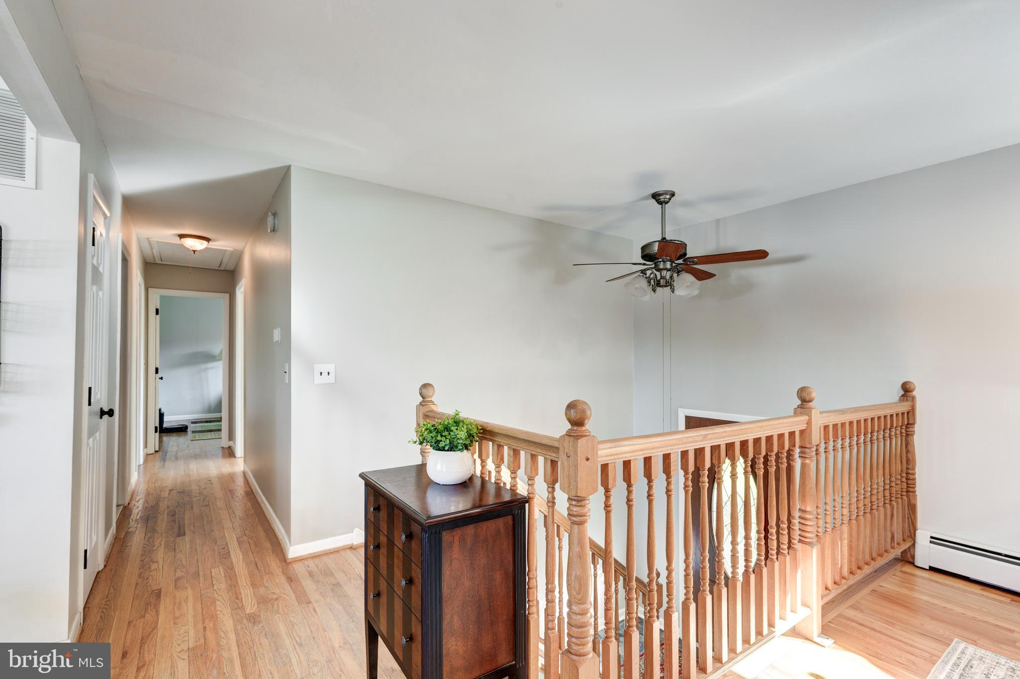 2108 Hanover Pike Hampstead, MD 21074 - Photo 18 of 51 a view of a hallway with a dining table chairs