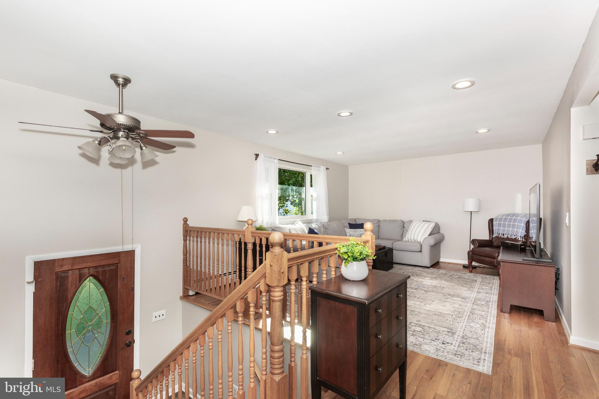 2108 Hanover Pike Hampstead, MD 21074 - Photo 19 of 51 a living room with furniture and a chandelier