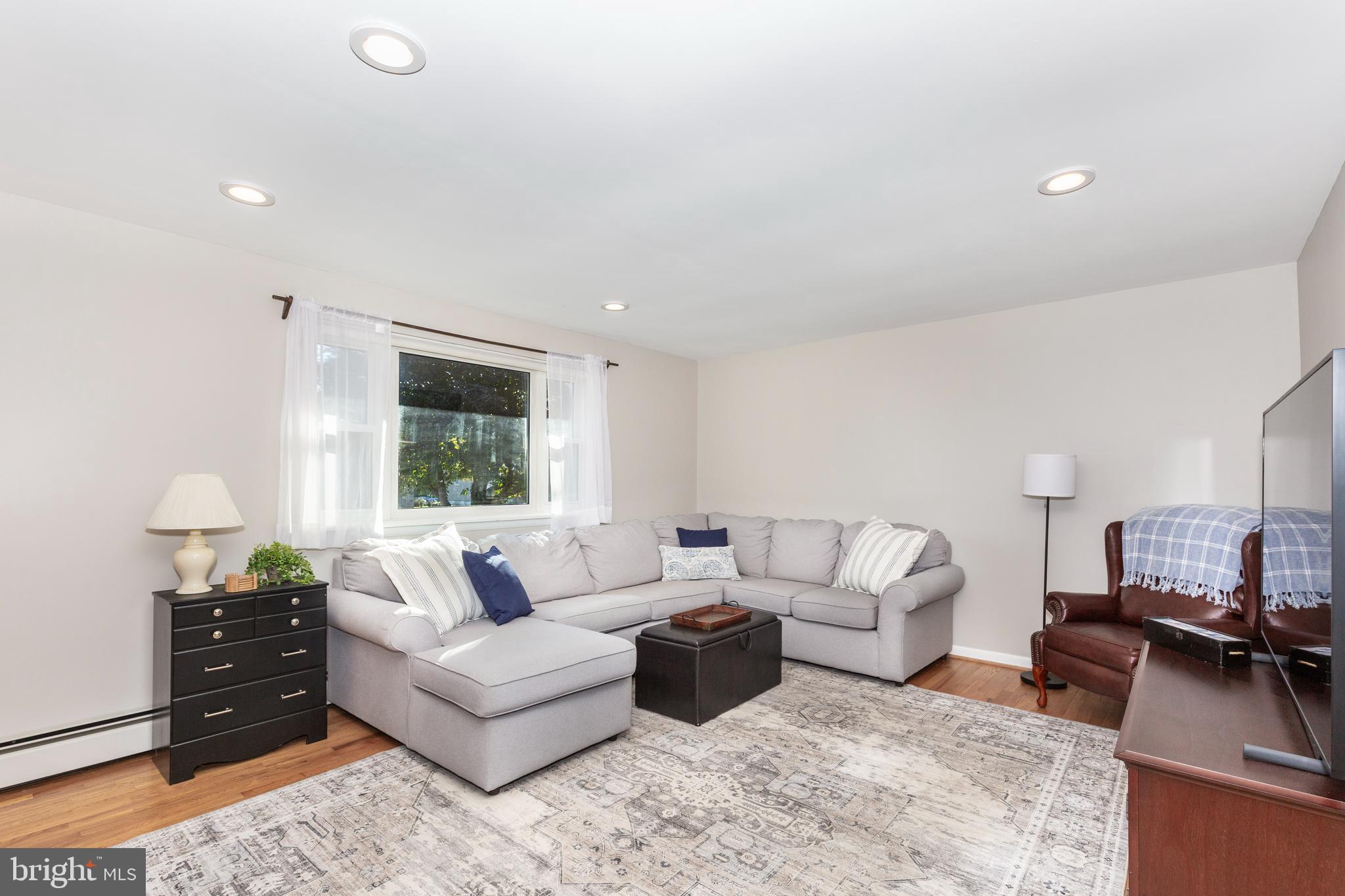 2108 Hanover Pike Hampstead, MD 21074 - Photo 20 of 51 a living room with furniture window and wooden floor