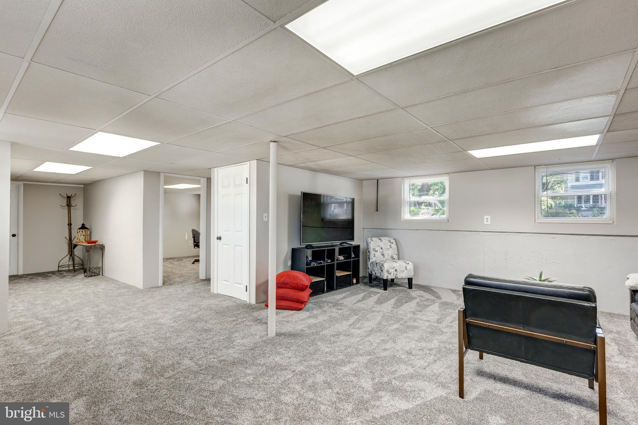 2108 Hanover Pike Hampstead, MD 21074 - Photo 33 of 51 a view of a livingroom with furniture and a flat screen tv