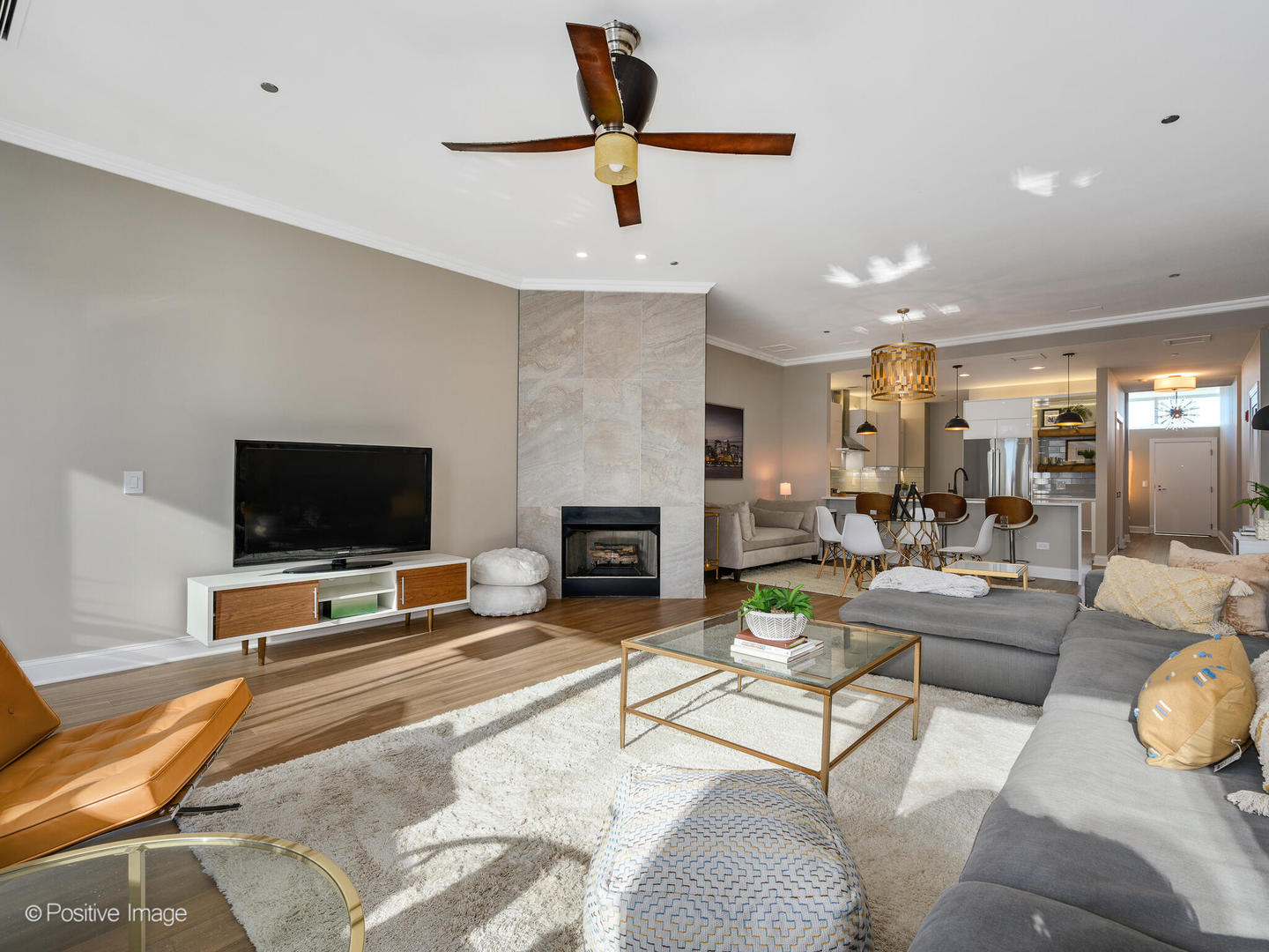 333 North Canal Street, Unit 2003 Chicago, IL 60606 - Photo 12 of 31 a living room with furniture and a flat screen tv