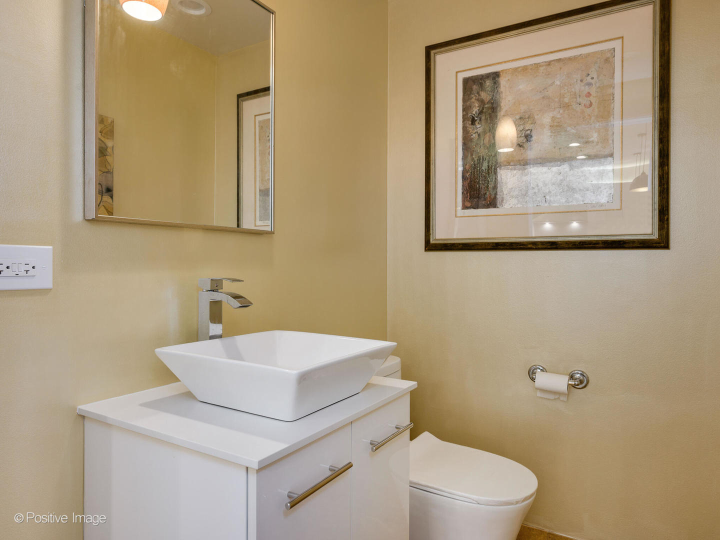 333 North Canal Street, Unit 2003 Chicago, IL 60606 - Photo 20 of 31 a bathroom with a toilet a sink and mirror