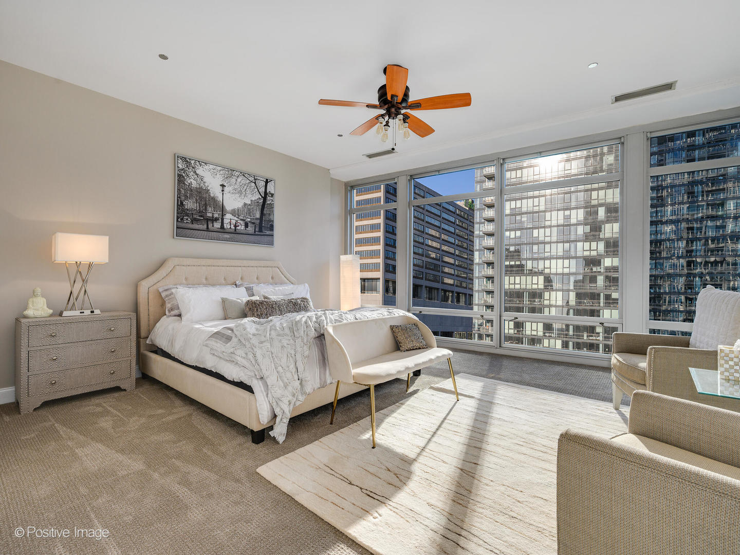 333 North Canal Street, Unit 2003 Chicago, IL 60606 - Photo 21 of 31 a spacious bedroom with a bed a couch and a large window