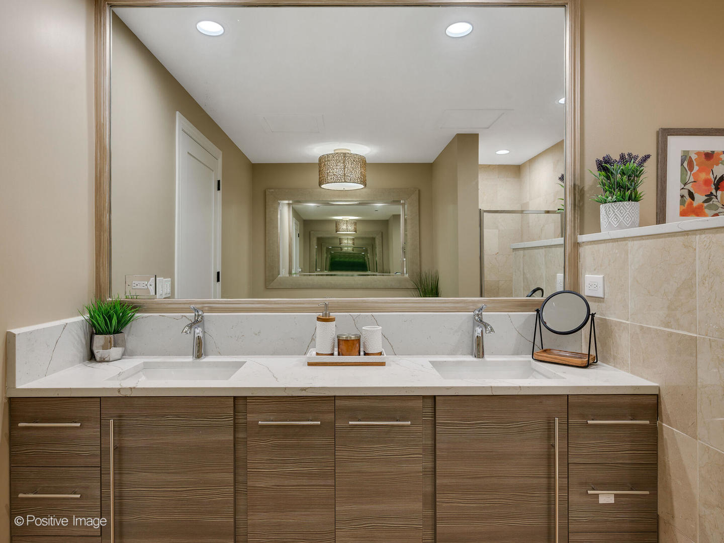 333 North Canal Street, Unit 2003 Chicago, IL 60606 - Photo 23 of 31 a bathroom with a sink and a mirror