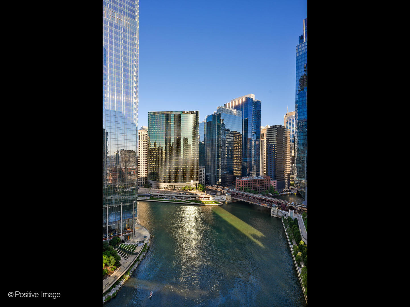 333 North Canal Street, Unit 2003 Chicago, IL 60606 - Photo 30 of 31 a view of swimming pool of water with lawn chairs and floor to ceiling window