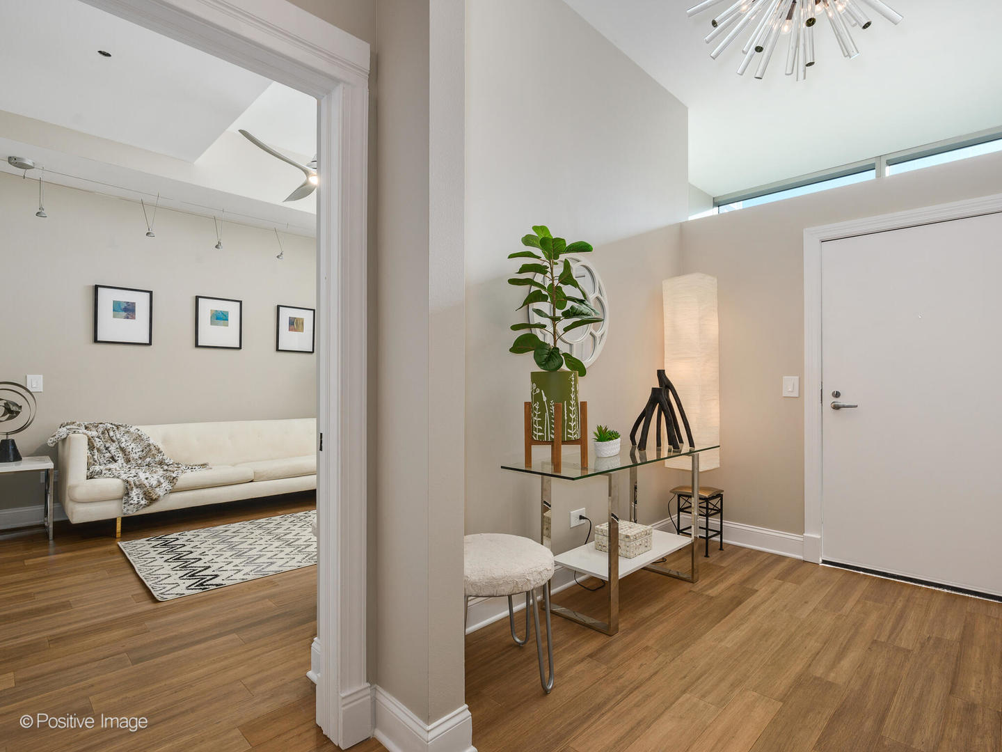 333 North Canal Street, Unit 2003 Chicago, IL 60606 - Photo 4 of 31 a living room with furniture and a wooden floor