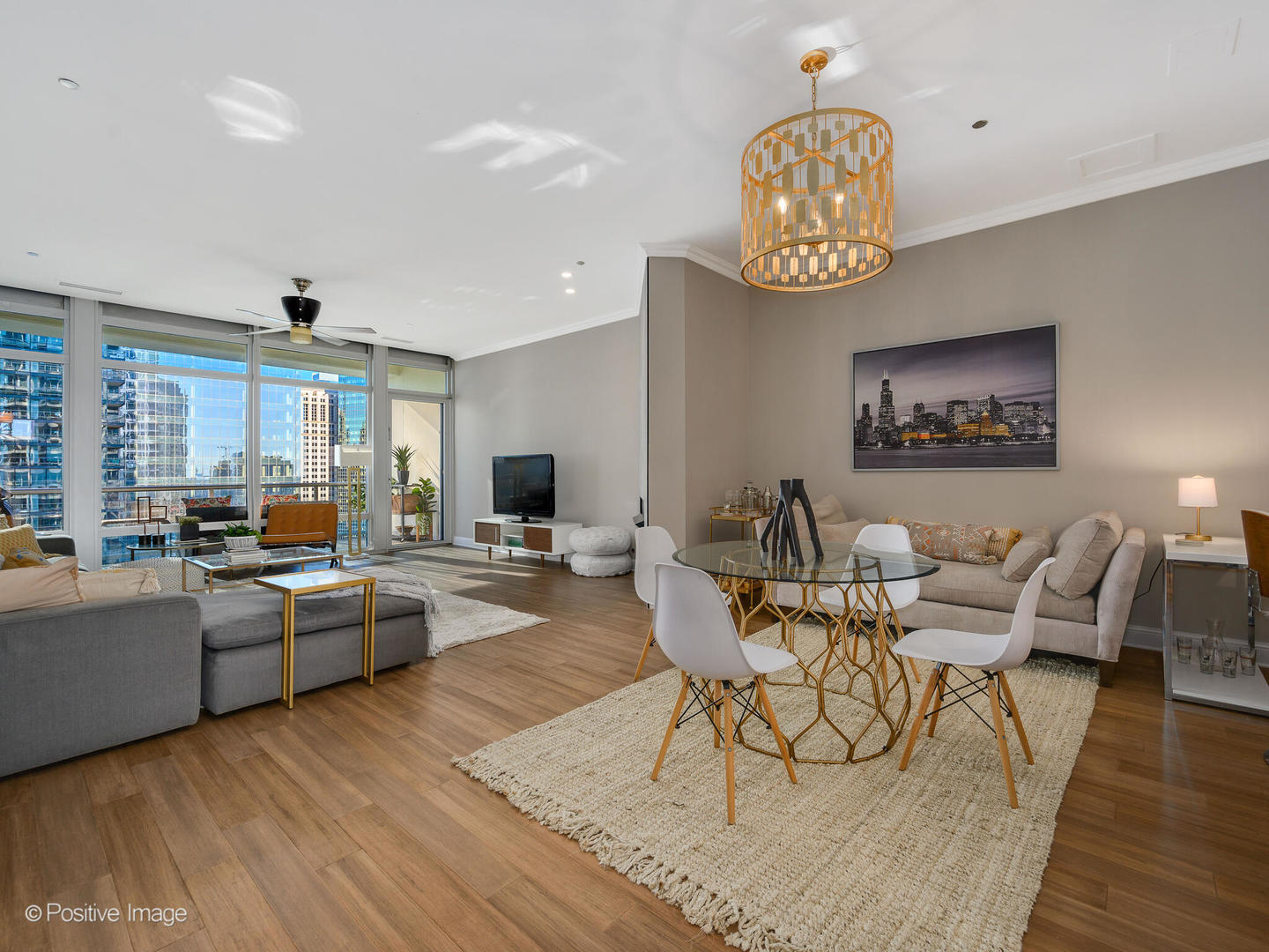 333 North Canal Street, Unit 2003 Chicago, IL 60606 - Photo 7 of 31 a living room with furniture a rug and a table