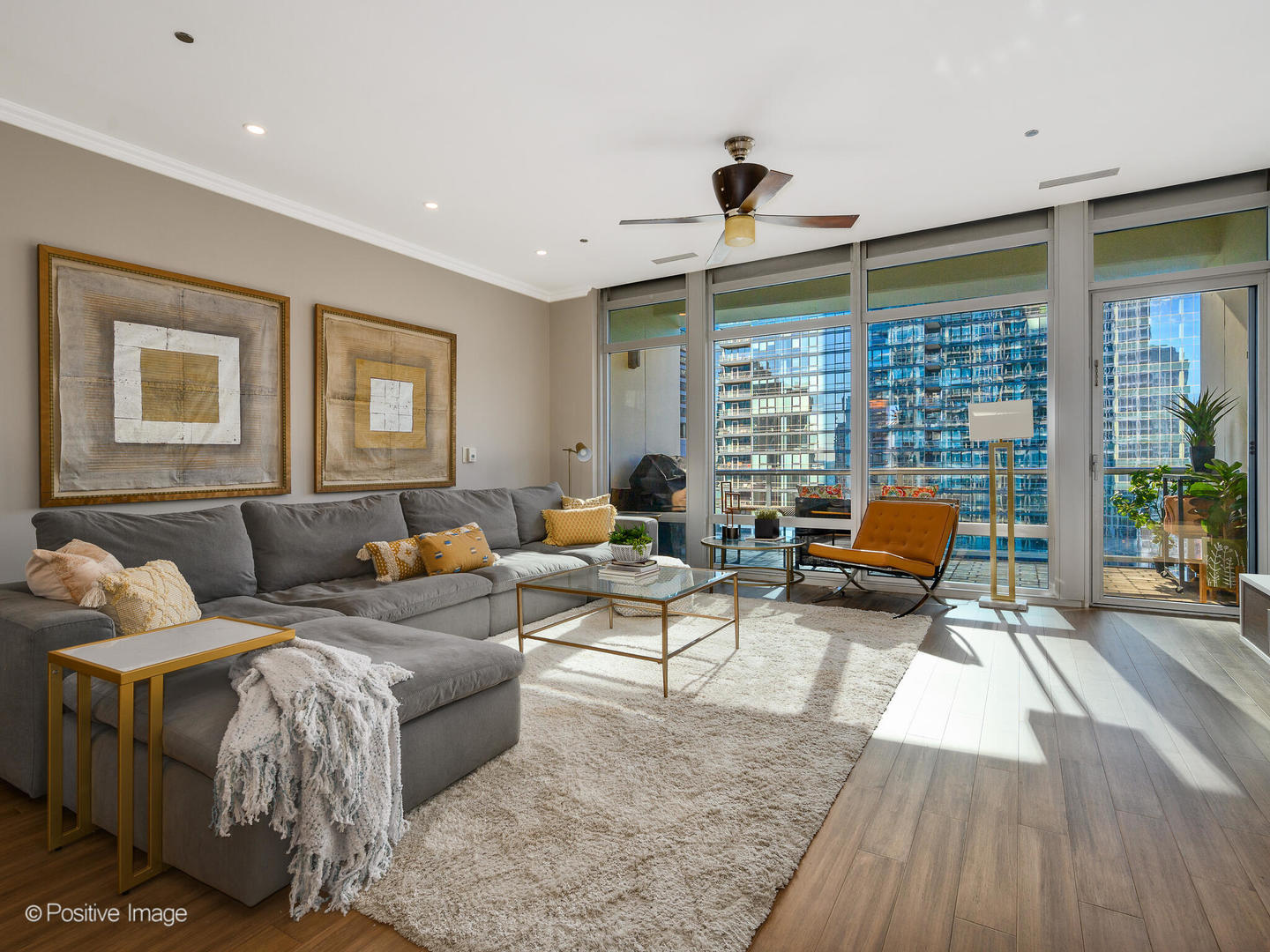 333 North Canal Street, Unit 2003 Chicago, IL 60606 - Photo 10 of 31 a living room with furniture and large windows